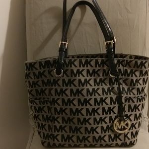 Michael Kors tan and black signature tote